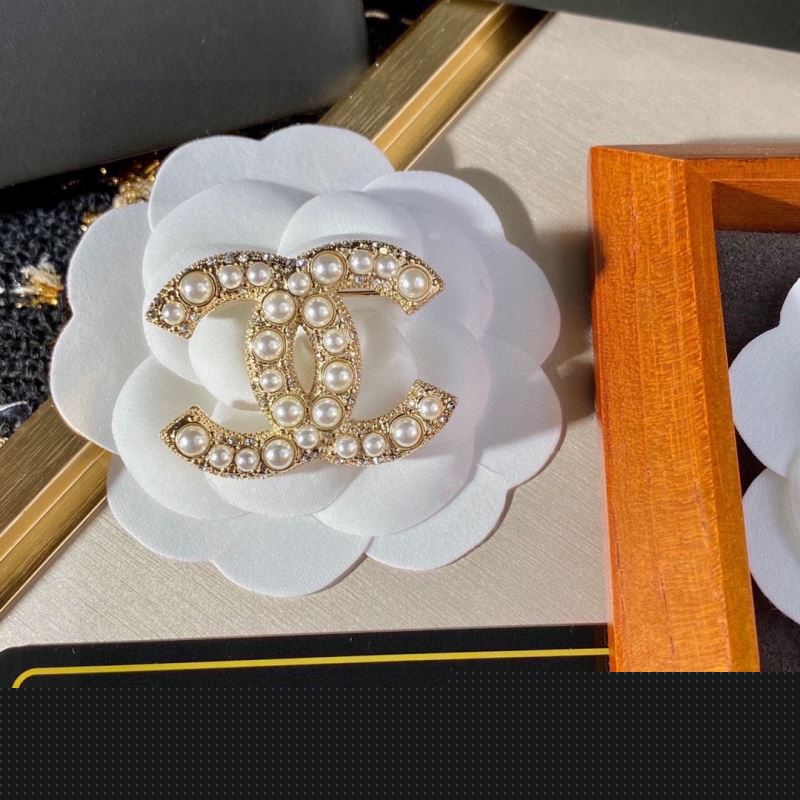 Ch*el brooches